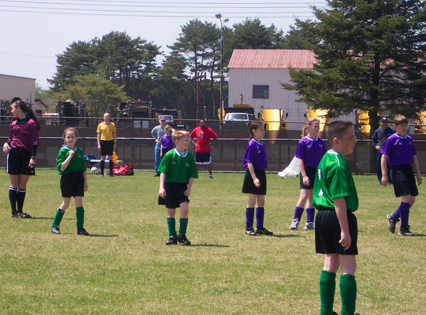 Mel playing soccer